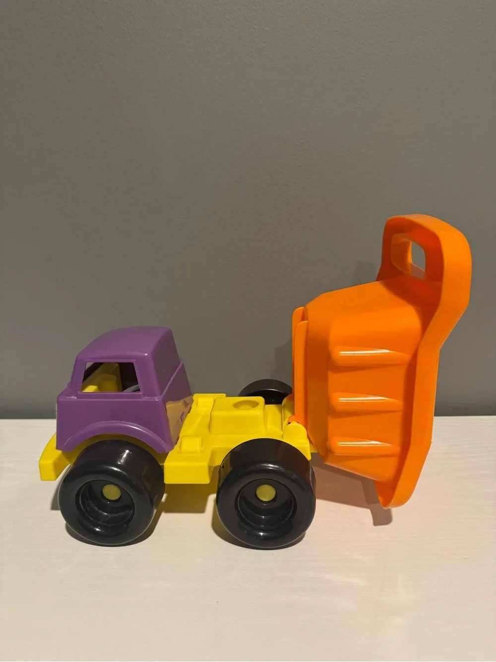 Purple & Orange Kids Dump Truck Toy - Sturdy Plastic Construction